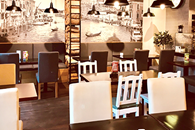 Sala w pizzerii Dominium by Domino's w Warszawie przy ul Polnej 48