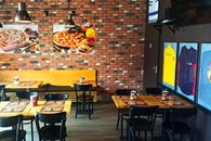 Strefa gości Dominos Pizza Warszawa Wilanów