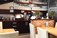 Sala w pizzerii Dominium by Domino's w Warszawie przy ul Krakowskie Przedmieście 16